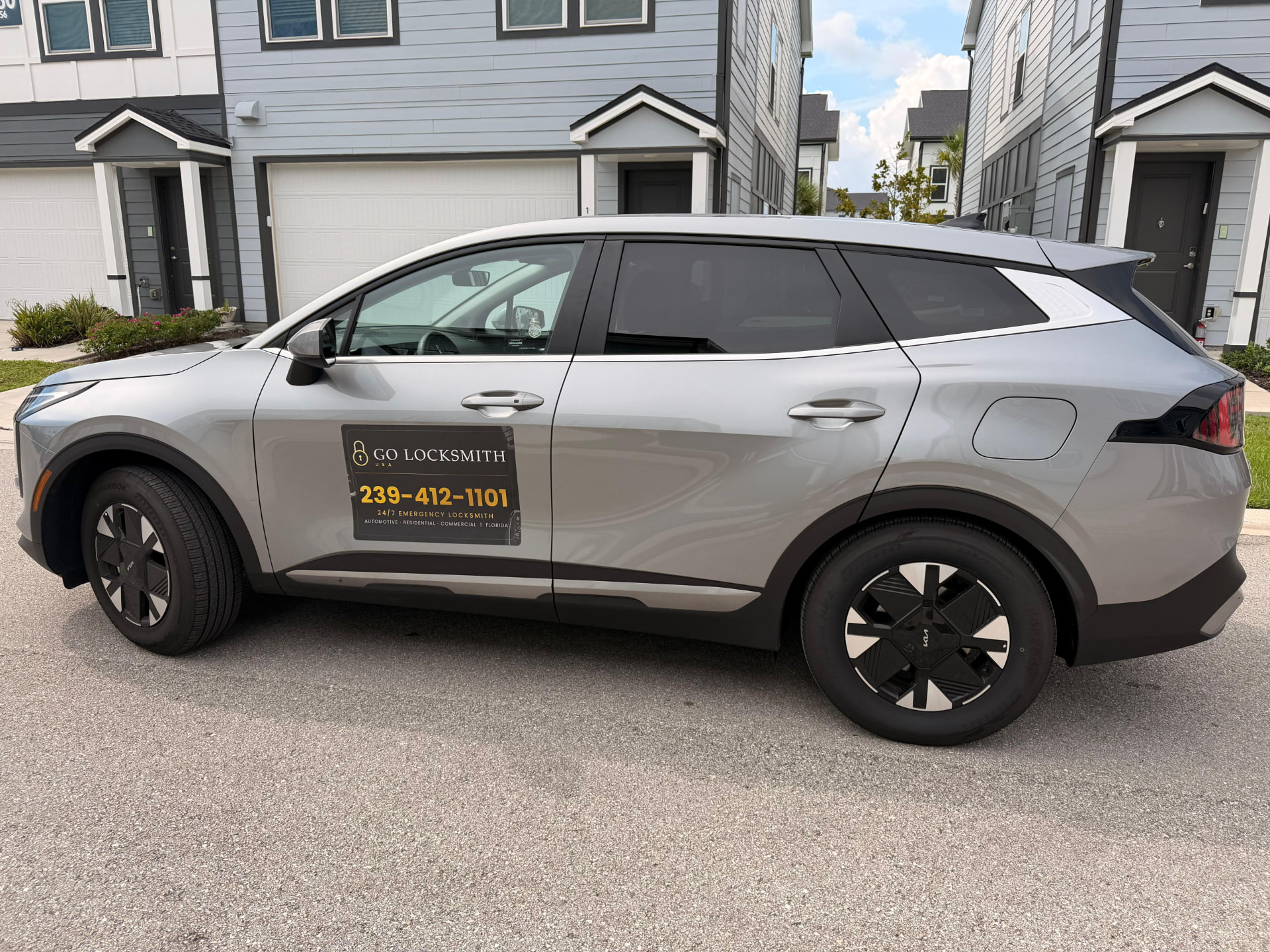 GO Locksmith USA service vehicle on a residential call in Southwest Florida